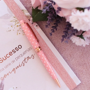 Pink pen with white polka dots